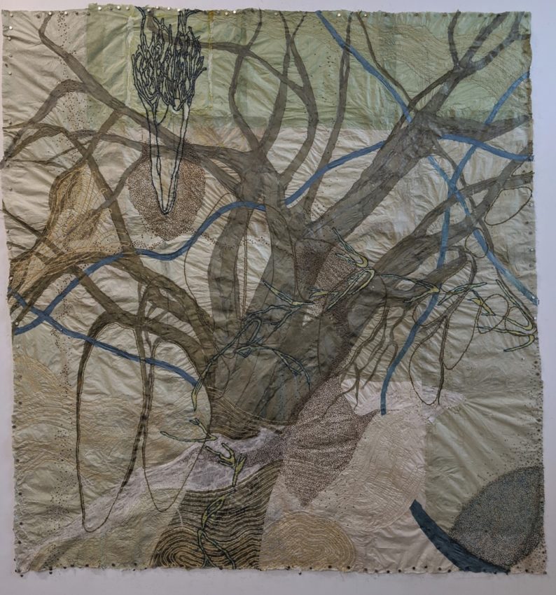 Nancy Cohen, Settling In (2019). Paper pulp, ink and handmade paper. Dimensions: 77 x 73 inches. ©Nancy Cohen 2019. Courtesy of the artist. The day Cohen settled into a studio in a neglected residential area, she found a welcome surprise. Some kind soul had removed a dilapidated building in the adjacent lot, revealing a view of a majestic, 7-story high tree outside her window. Marveling at the pollution and neglect the tree must have endured to survive, Cohen created Settling In to pay homage to the tree’s resilience and to remind us to notice and treasure nature’s wonders in our midst.