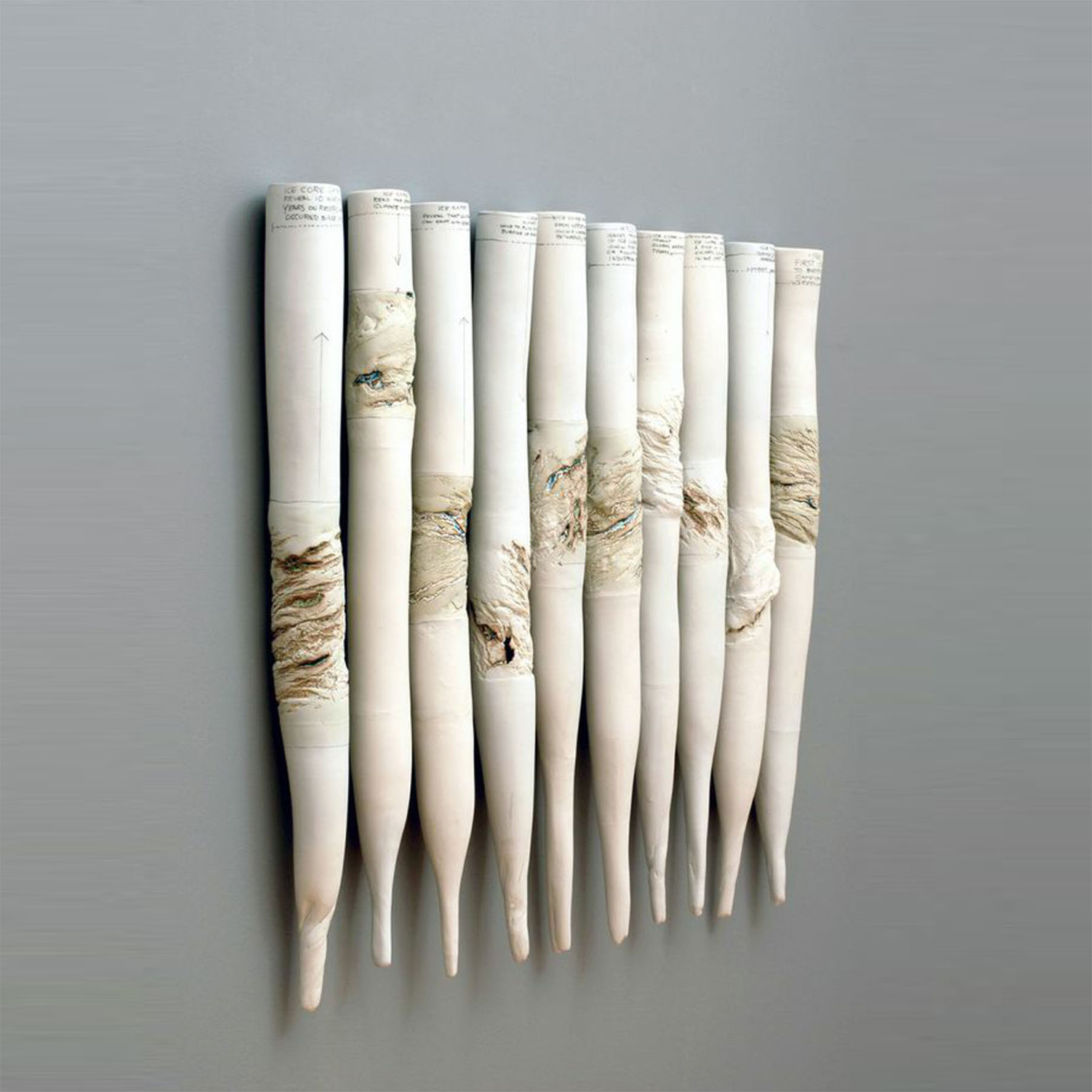 Paula Winokur, Ice Cores (2010). Porcelain. Dimensions: 34” x 5” (each core), total width 42”. ©Paula Winokur 2010. Courtesy of the artist.